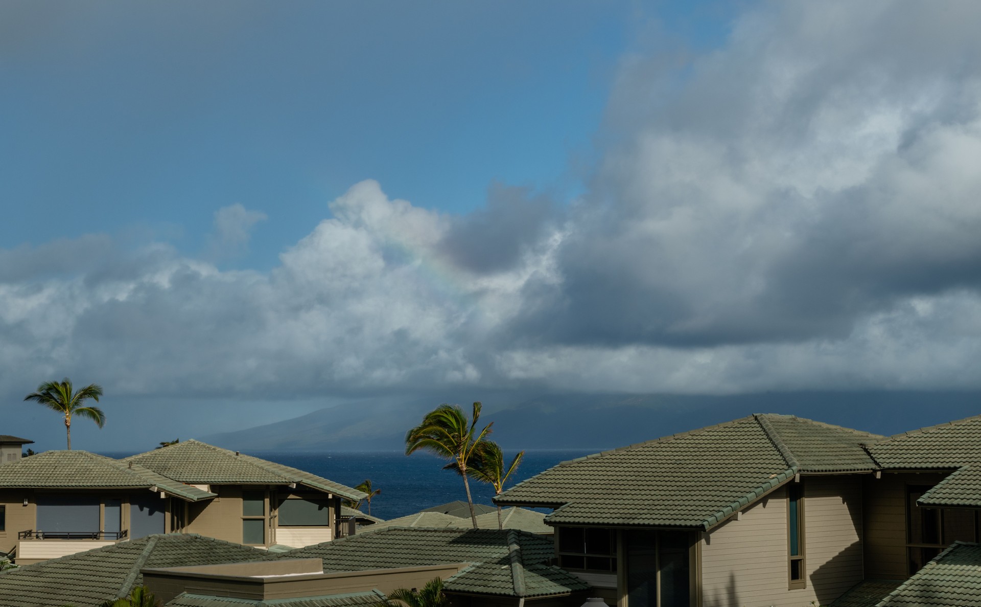 Scenic West Maui vista with a rainbow over Molokai, Hawaii